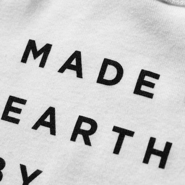 imagen de Made on Earth by Humans Onesie